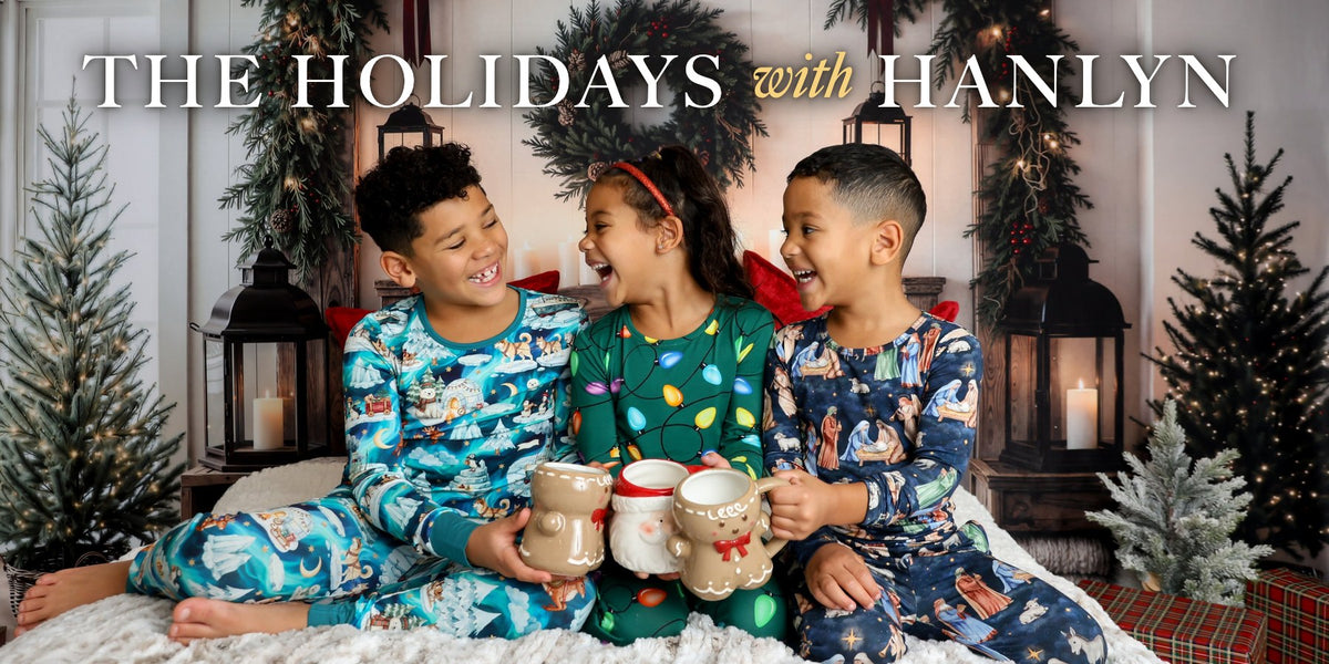 Three kids in Hanlyn holiday pajamas laughing with Christmas mugs. The Holidays with Hanlyn